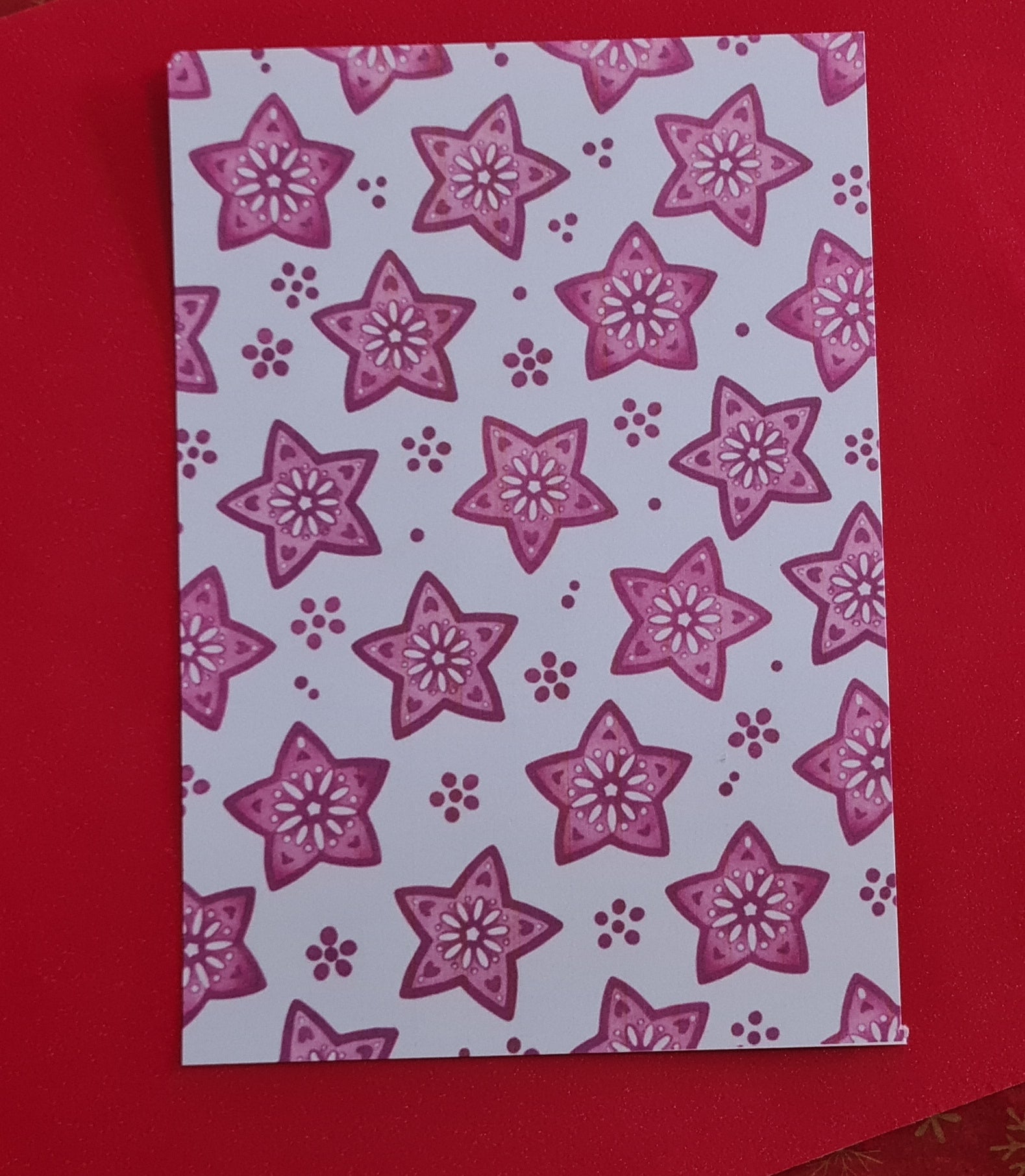 Papier de fond étoile rouges de noël